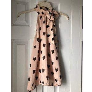 High-neck pale pink tank blouse with heart pattern